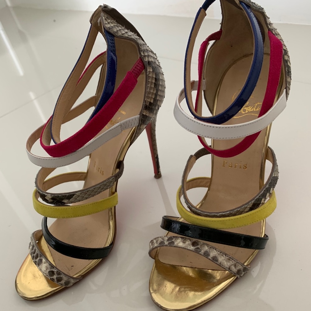 Christian Louboutin red bottoms, strappy heels